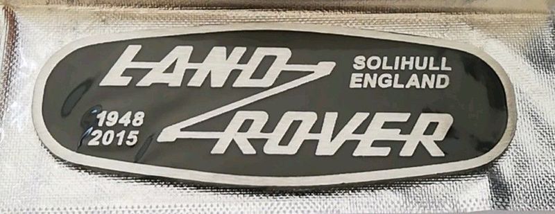 Land Rover Defender Heritage grille emblem badge
