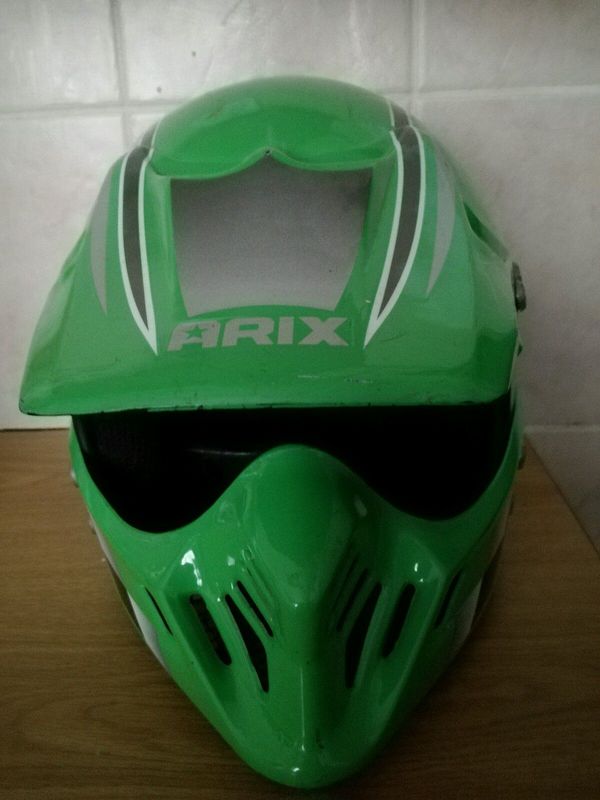 Green and silver Arix helmet