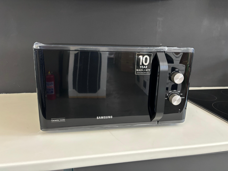 Samsung New Open Box 23L Electronic Solo Microwave Oven with Auto Cook and 6 Power Levels, B-MS23K36