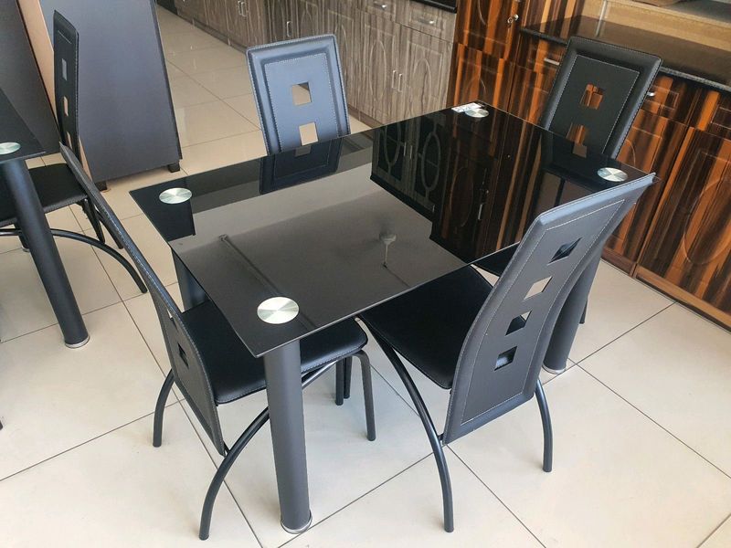 New 4 piece table and chairs