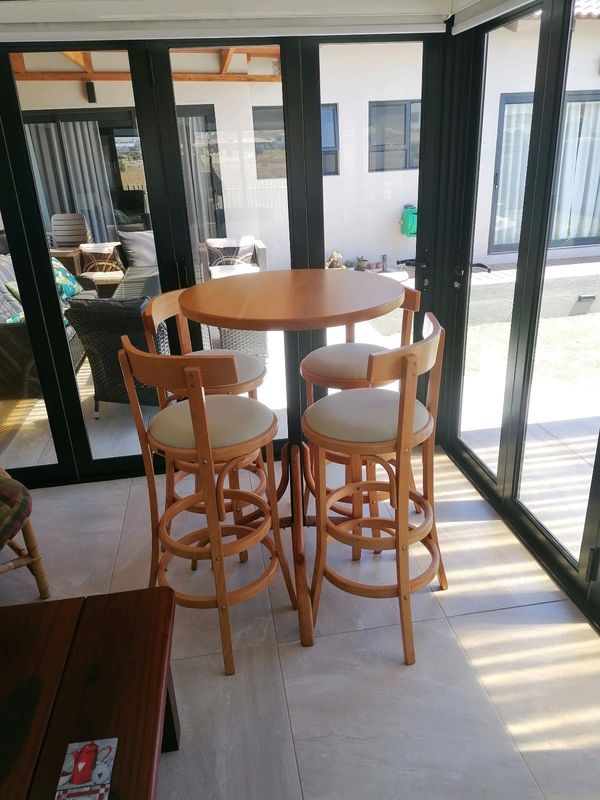 Bistro table and 4 chairs. As new. Never used.