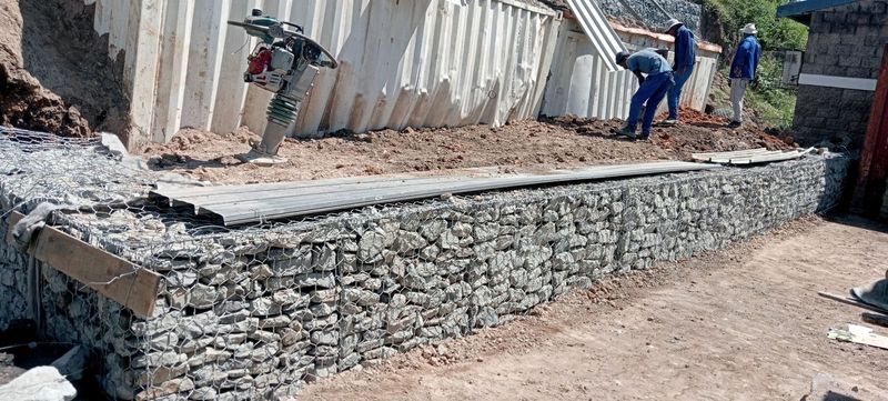 Gabion buskets,tar surfacing, Retaining wall, Paving, Borehole drilling, Fencing, Welding experts