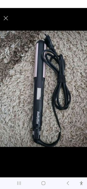 Babyliss 2 in 1 curling and straightening iron