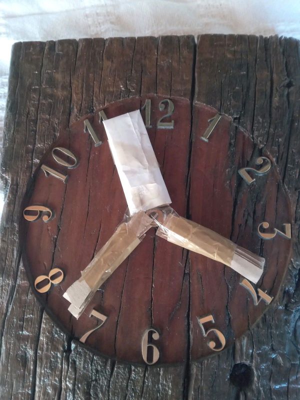 Old style wooden clock for sale.