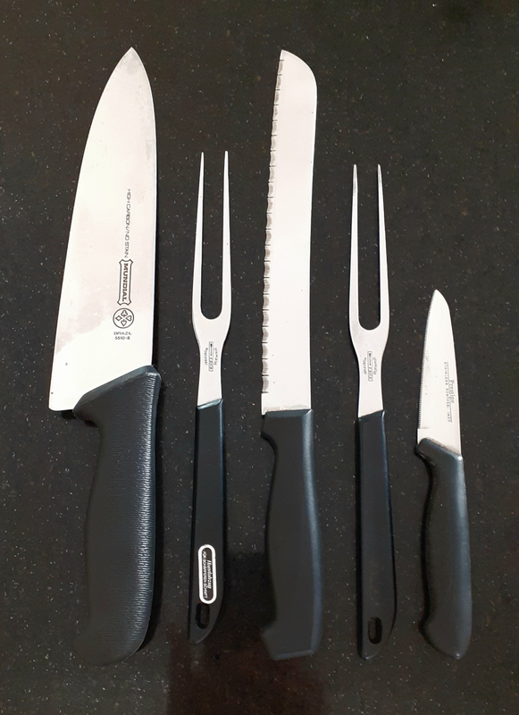 Vintage carving knives and forks. Plastic handles.