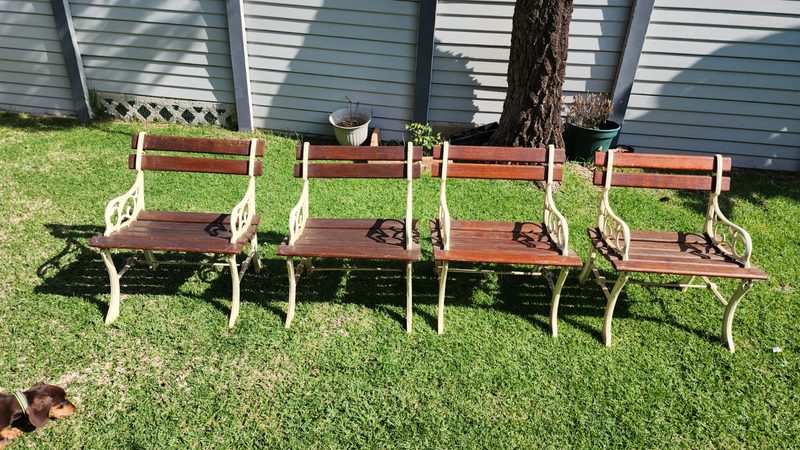 4x Cast iron and wooden chairs