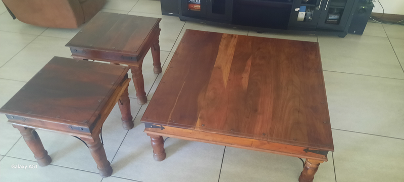 1 x 122cm x121cm coffee table and 2x 61cm x 61cm side tables heavy solid wood price negotiable