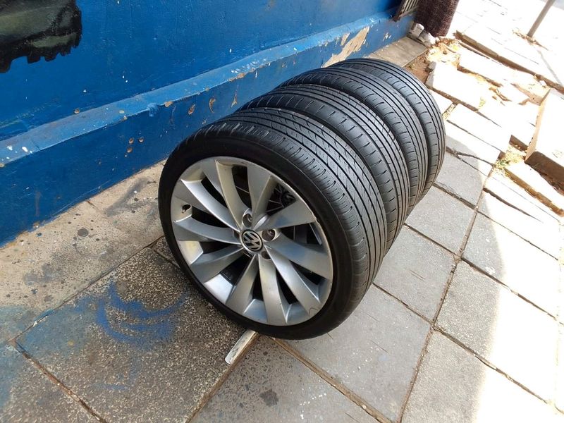 A set of 18inches OEM VW passat CC mags 5x112 p c d with tyres also fit VW golf 5/6/7 and VW caddy