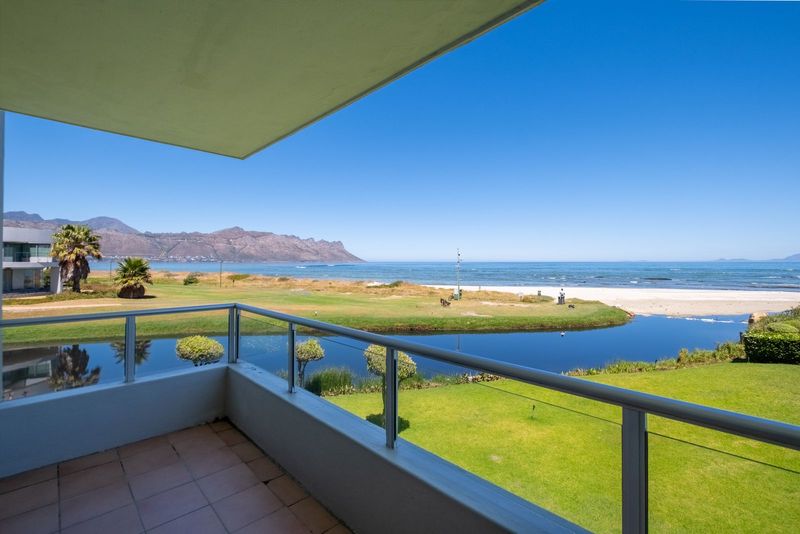 Breathtaking sea and mountain views… Beachfront apartment in Emerald Bay!