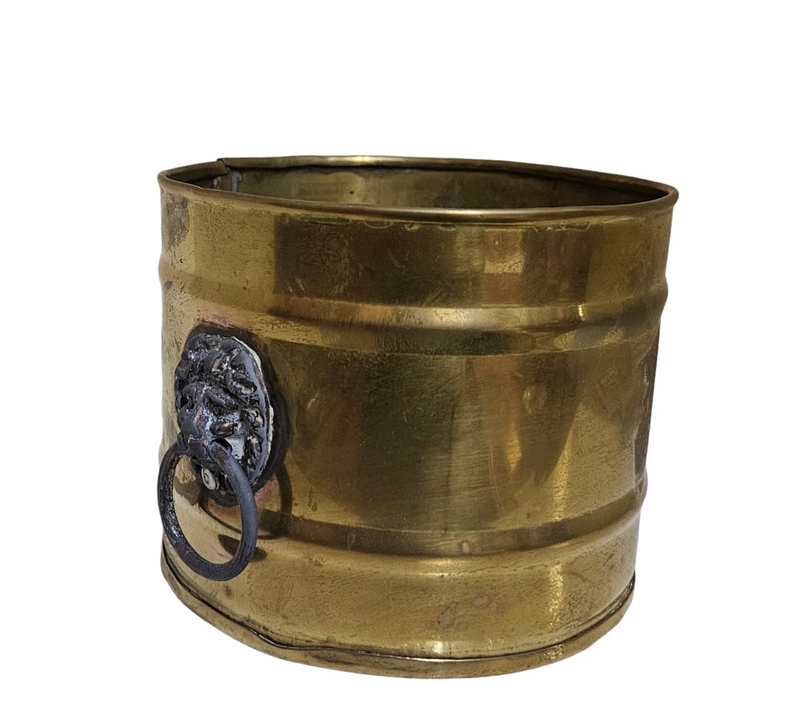 Vintage brass planters decorated with lions heads and rings