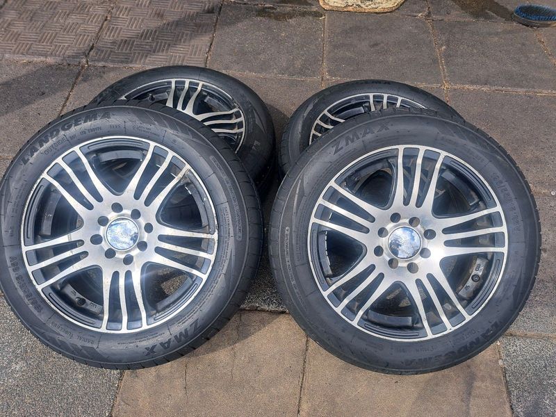 15 inch univesal mags with 195 55 r15 tires.