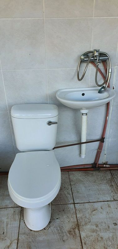 Toilet set (Stainless steel shower and bath mixer tap, water closet plus it&#39;s pipes and basin)
