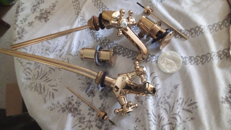Taps Gold platted pair of basin mixer taps and waists