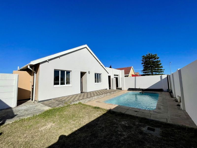 Discover Serenity: 3-Bedroom Strandfontein Oasis with Pool, Parking and Security!