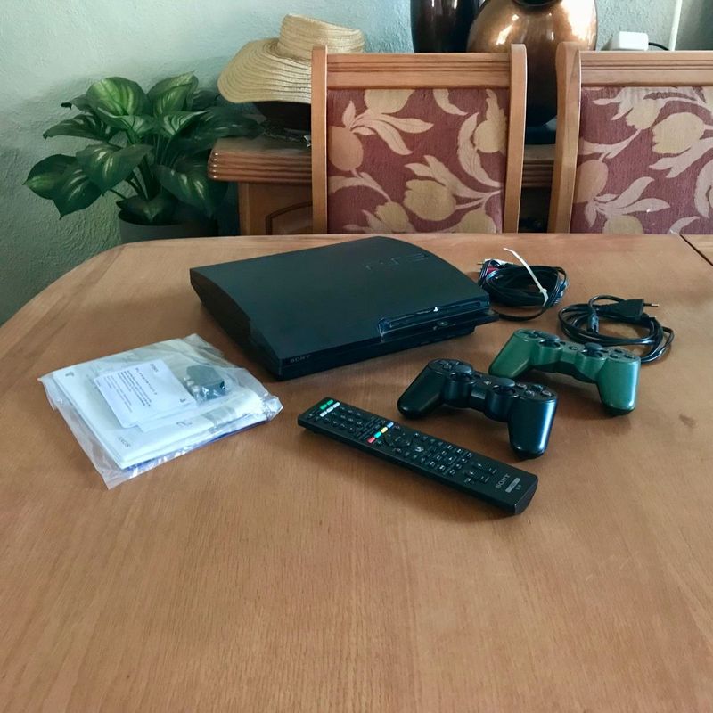 Working Sony PlayStation PS3 Slim 250GB Console w/ 2 x PS3 DualShock 3 Controllers &amp; Remote