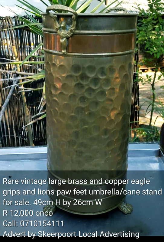 Rare vintage large brass and copper eagles grip and lions paw feet umbrella/cane stand for sale