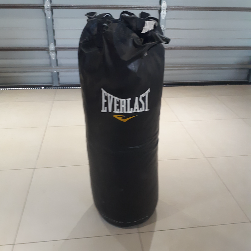 Boxing bag with bracket and gloves