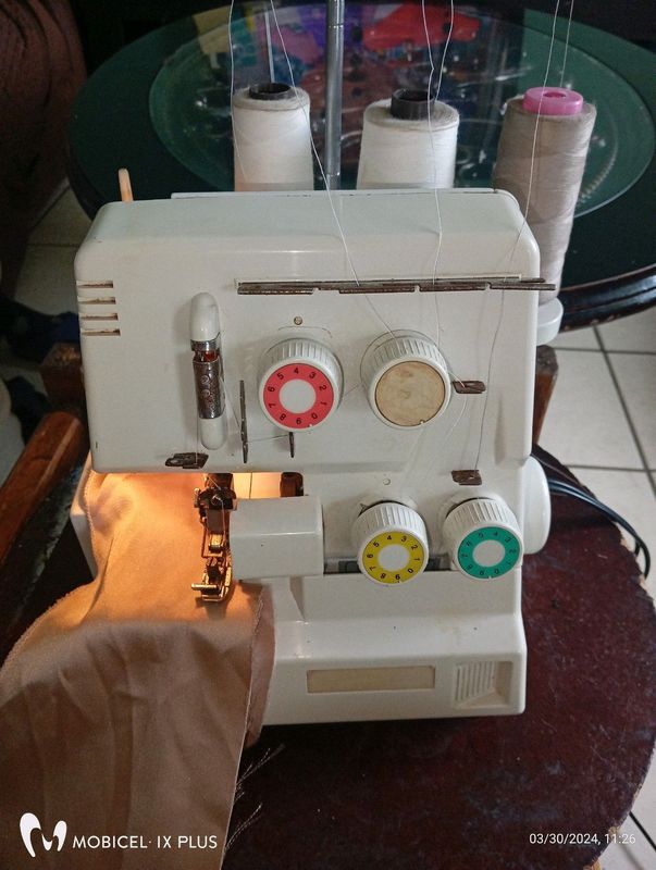 Empisal s4d overlocker machine for sale r1000 in a working condition as shown on the pictures locate