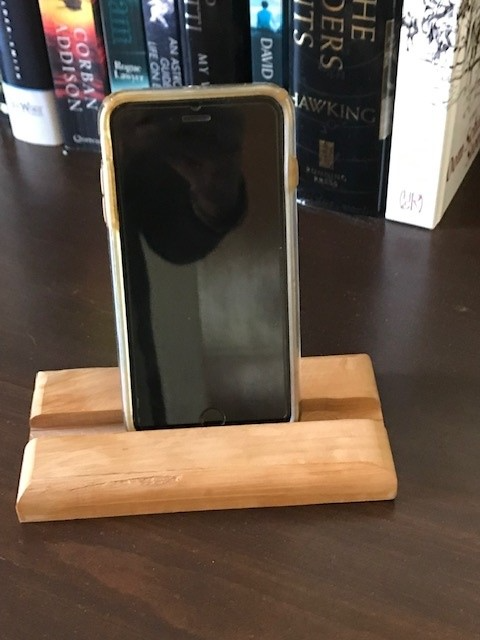 Cellphone stands. Hand-made using reclaimed wood.