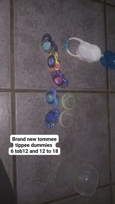 Tommee Tippee dummies new and nuk dummies and bottles