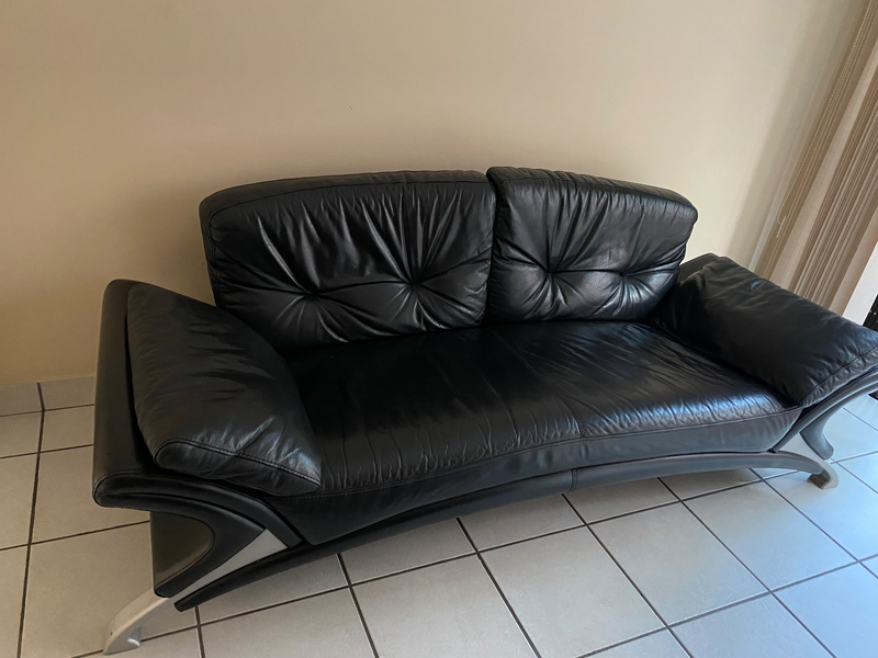Two genuine black leather couches