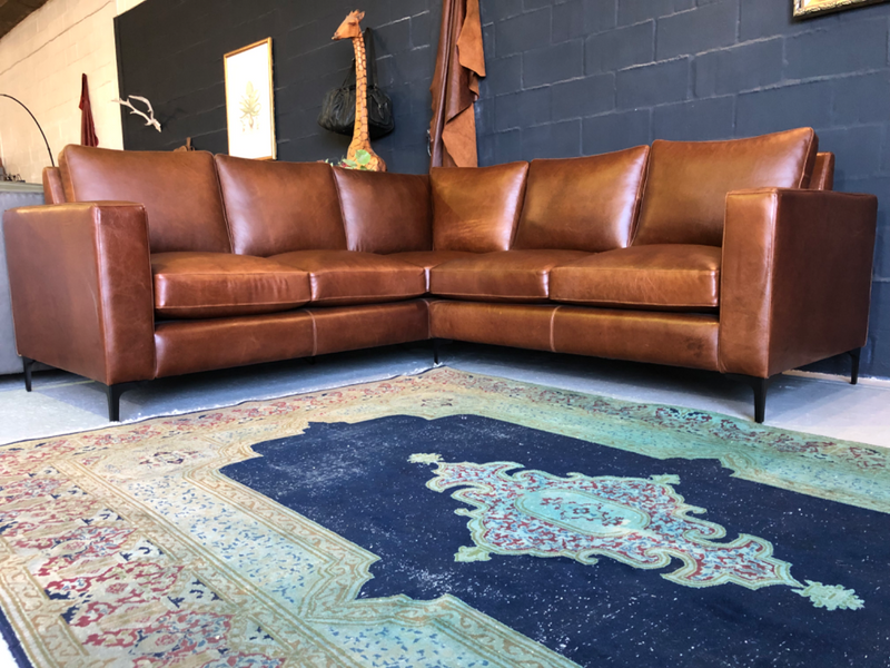 Brand new 2.5m x 2.5m full  genuine leather L-shape corner lounge suite. (A MODERN SLIMLINE DESIGN)