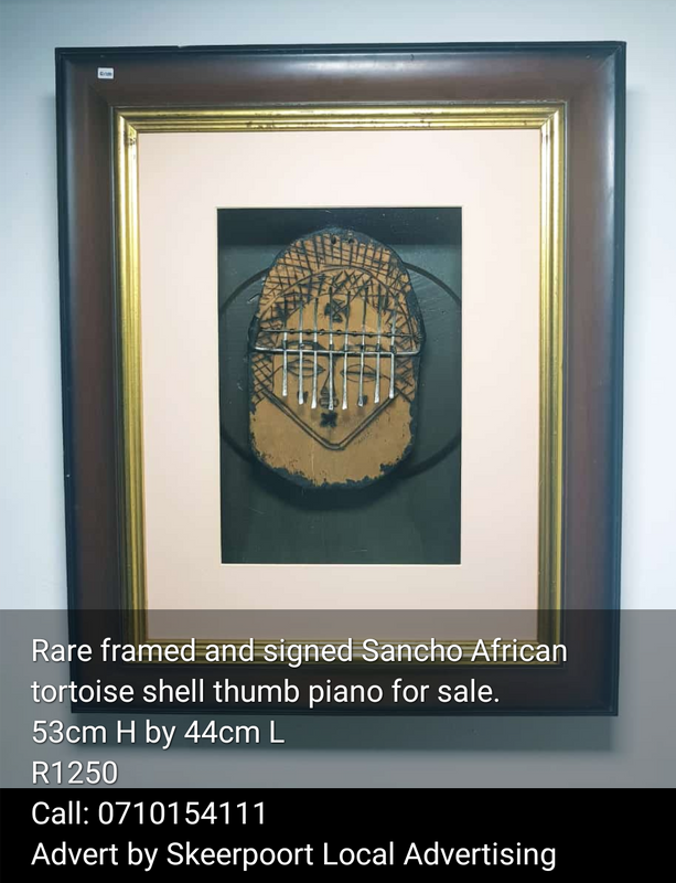 Rare framed and signed Sancho African shell thumb piano for sale
