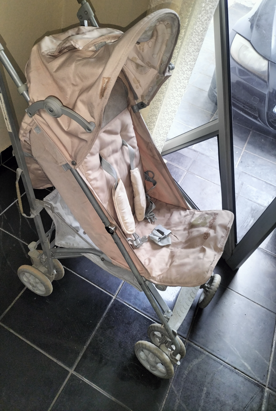 Cream In Colour Baby Stroller and Mothers Choice Baby Carrier.  Both for R700