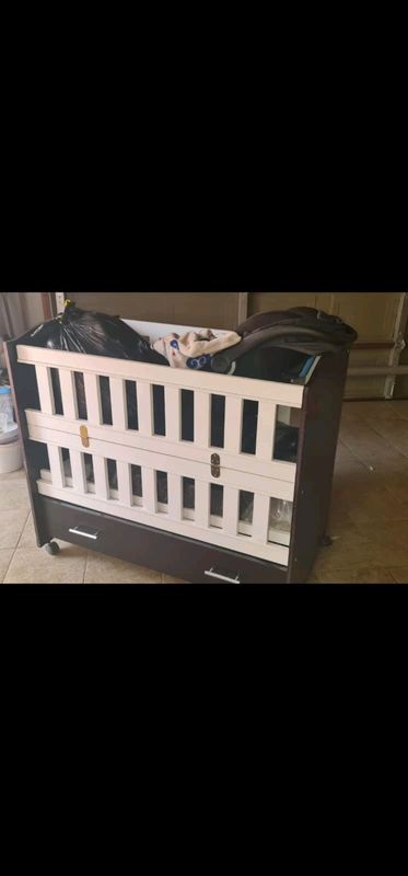 Baby cot and drawer set R2999 fot the set of R1300 for the cot.