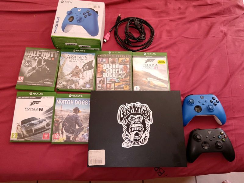 X box one x 1tb &#43; 2 remotes brand new 7 games &#43; chargeable battery&#39;s