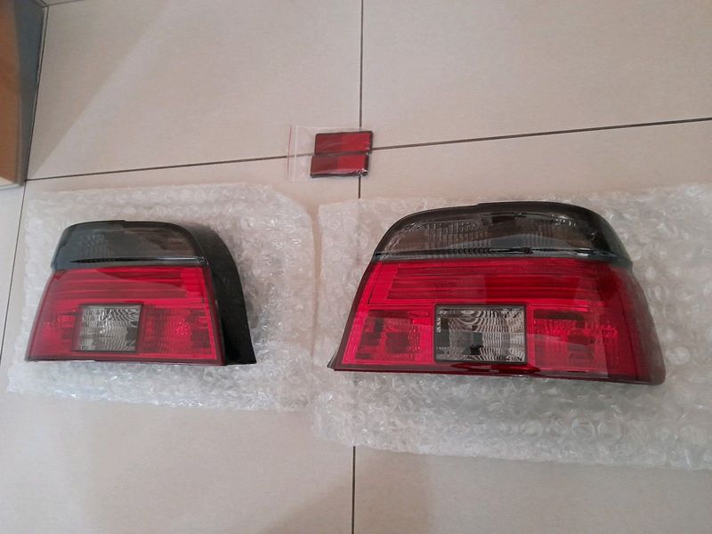 BMW E39 BRAND NEW SEMI SMOKED TAILIGHTS SET FORSALE R2800.