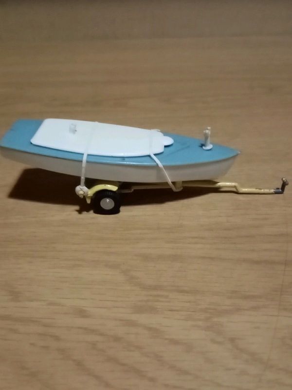 Die-Cast 1:43 Trailer and Dinghy. For Sale R100. Phone Cell 0794954164 or W-app Paul.