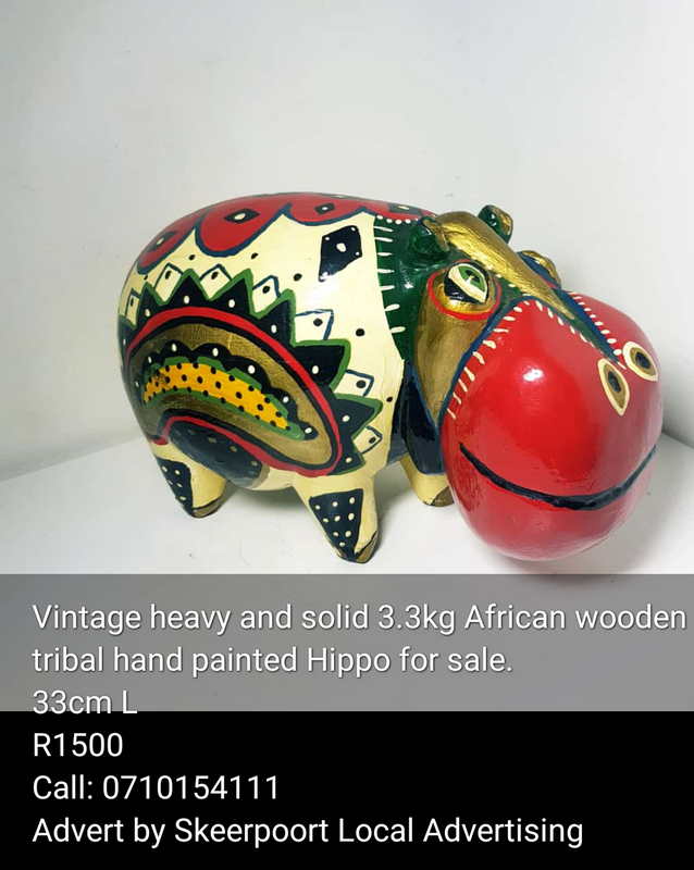 Vintage 3.3kg heavy and solid African wooden tribal hand painted Hippo for sale.