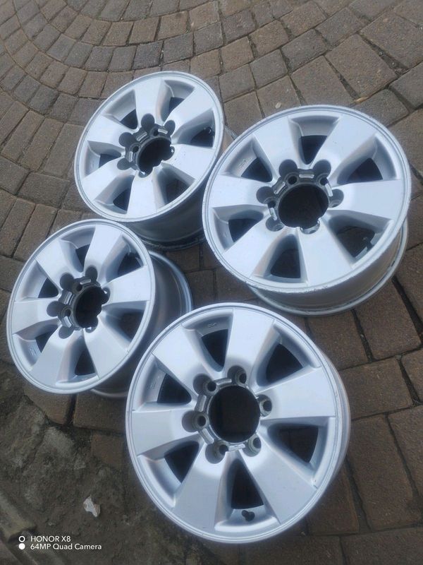 16Inch TOYOTA FORTUNA Magrims 6Holes WTH NO CENTRE CAPS A Set Of Four On Sale.