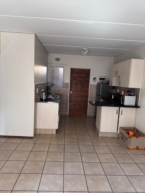 2 bedroom apartment, including a kitchen unit and a sitting room space. 1 bathroom
