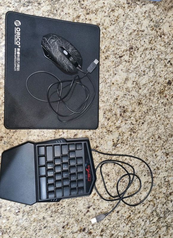 One hand keyboard with mouse and mousepad