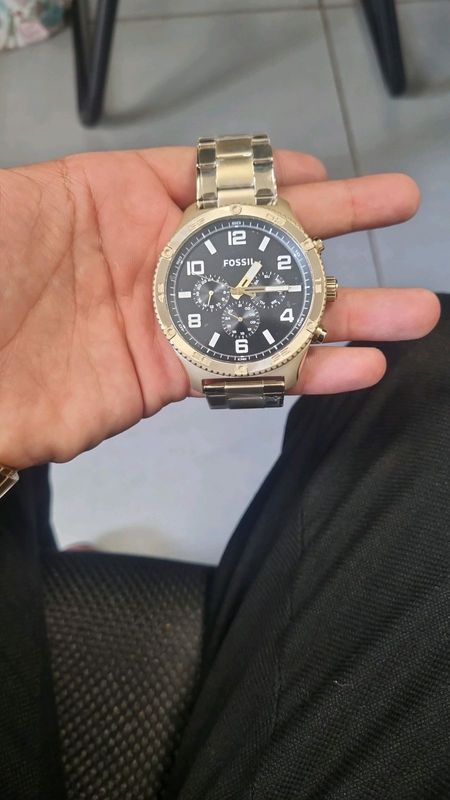 Gold Fossil watch for 1.5k
