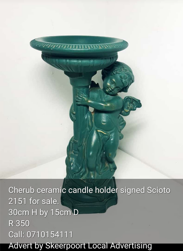 Signed Cherub ceramic candle holder for sale