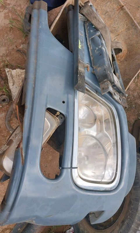 Actros mp2 headlight an bumper piece for sale