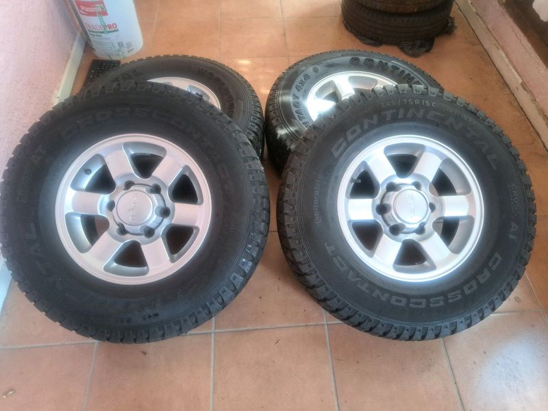 15 Inch Isuzu Mags with 245/75R15 Continental tires.