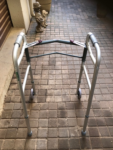 Folding walker for the elderly.