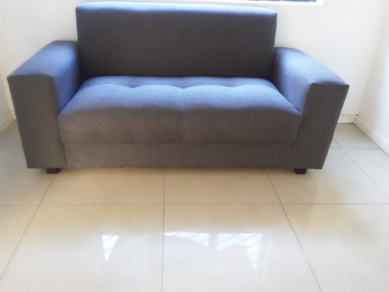 new grey 2 seater couch