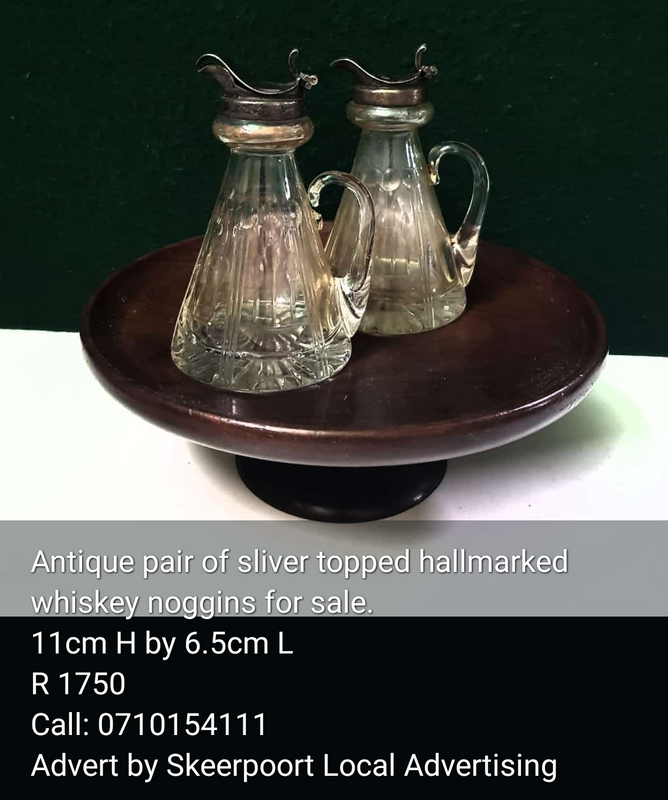 Antique pair of silver topped hall Marked whiskey noggins for sale.