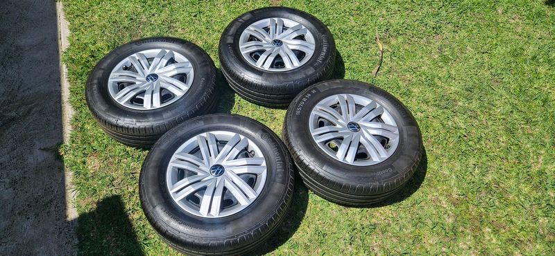 VW POLO STEEL RIMS WHEELCAPS AND CONTI TYRES