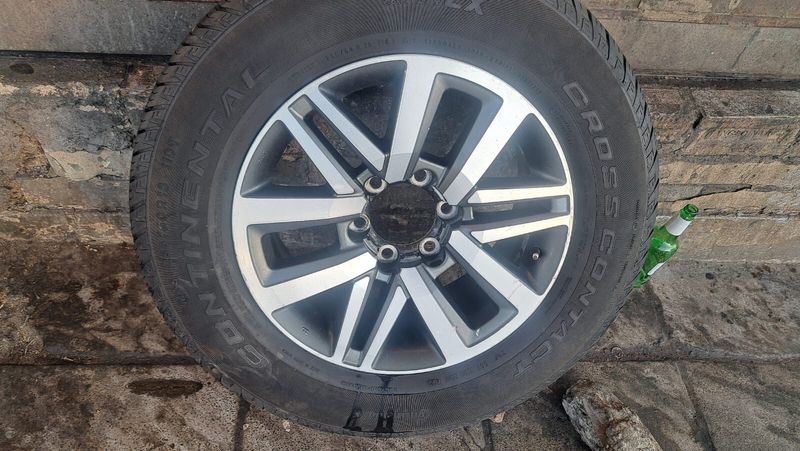 18 inche toyota mags 4 gt6, fortuner with continental tire. leave your WhatsApp number if interested