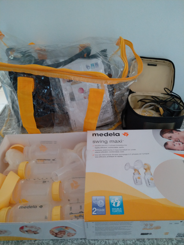 Medela electric breast pump - swing maxi. With all accessories and travel bag.