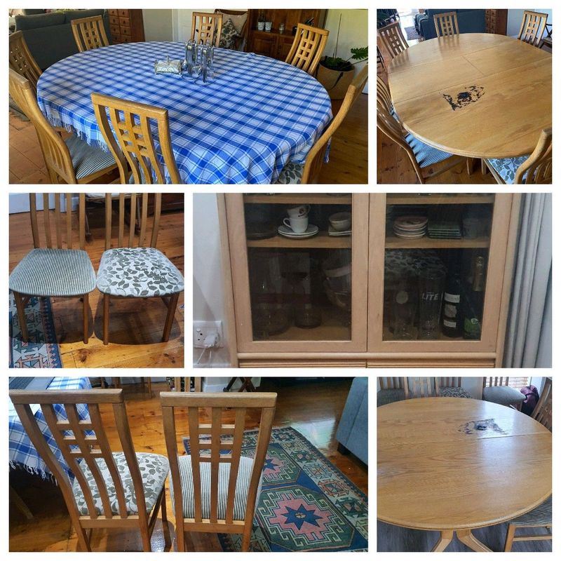 Oak Dining room set, 10 chairs , expandable table and drinks cabinet
