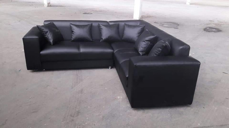 Black leather L shape couch