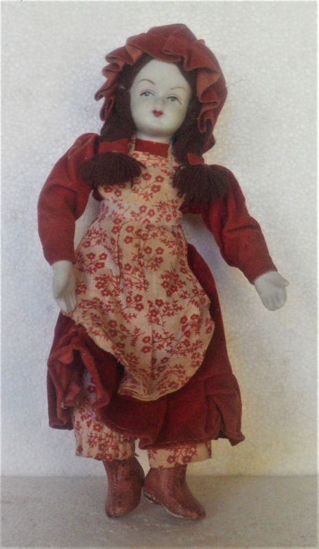 Vintage - Small Porcelain Doll with Bendable  arms and legs