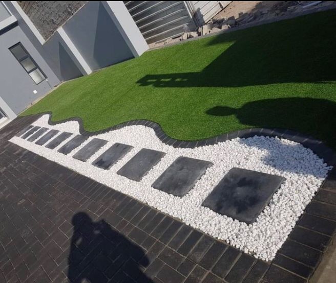 Artificial synthetic grass installation